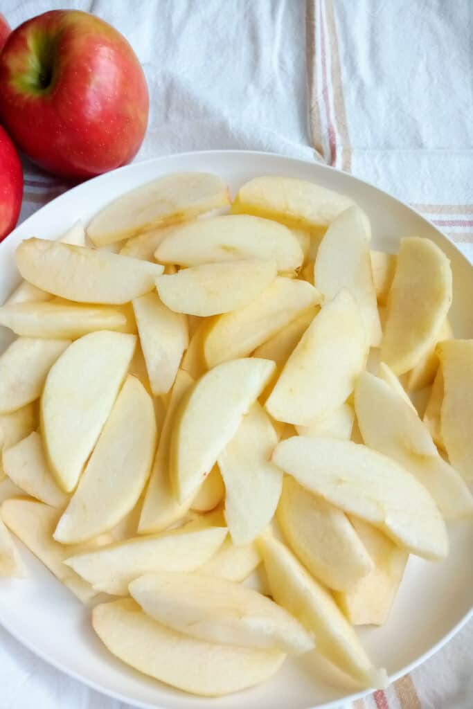 Chopped apples sliced in equal in sizes so they cook evenly.