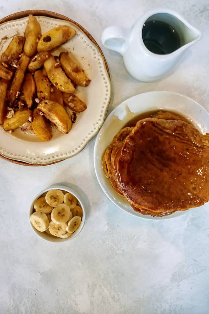 Bananas and apples taste great with pumpkin spiced pancakes.