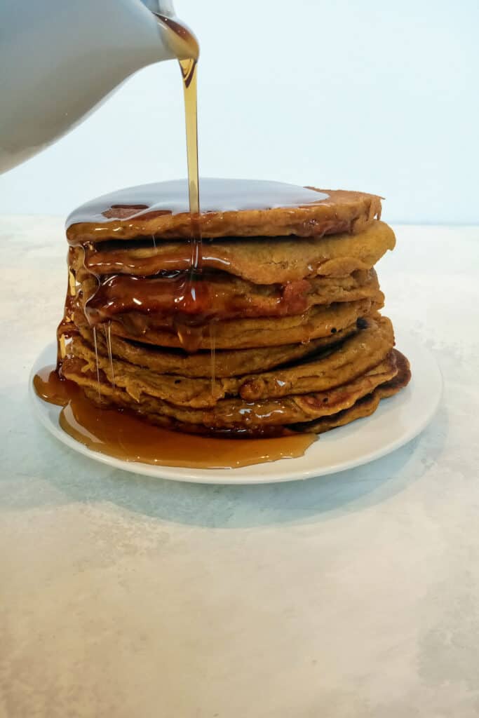 Vegan pancakes smothered in syrup. No wonder kids love this breakfast option. Yum!