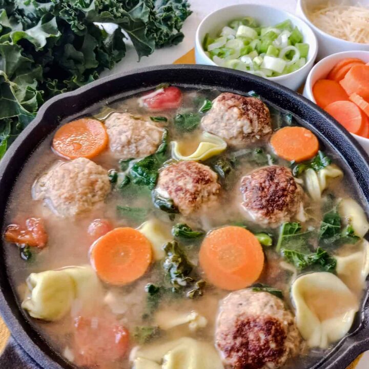 Meatball tortellini soup with fresh vegetables and Cajun meatballs.