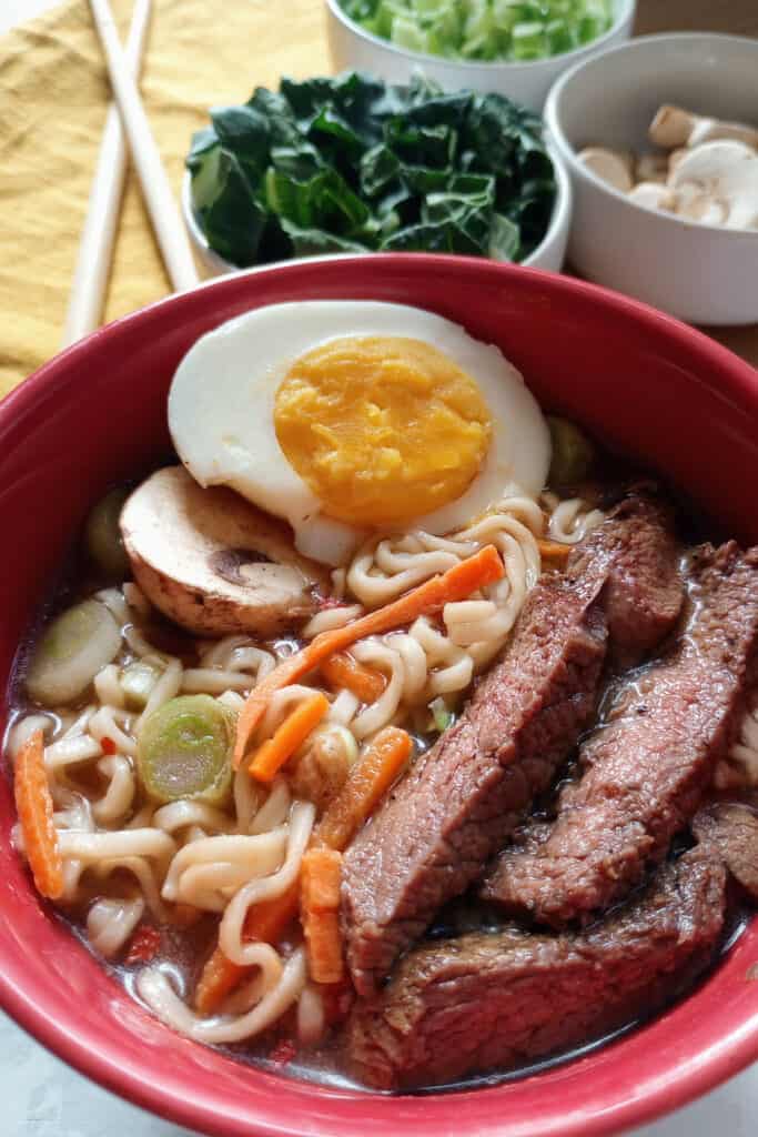 Drizzle noodle soup with garlic chili sauce for a spicy, hot, taste.