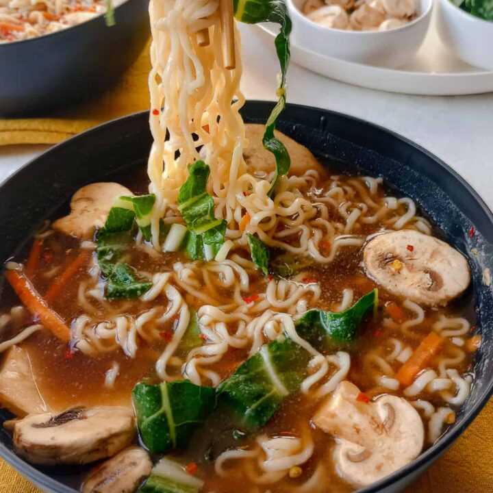 TikTok noodle soup with sliced mushrooms, bok choy, and steak.