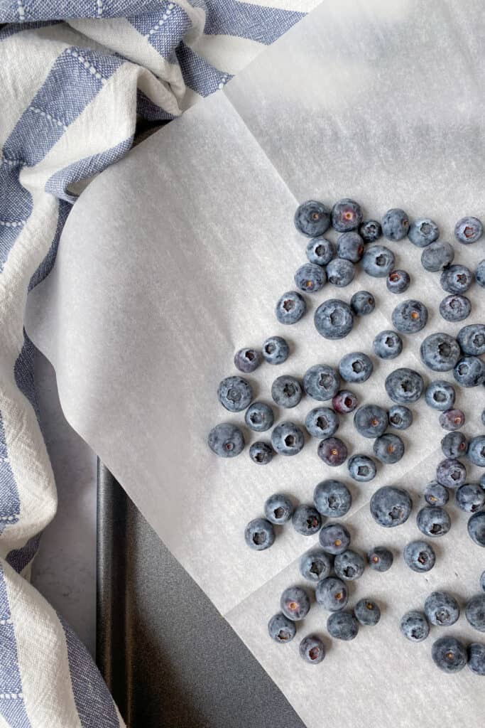 Tray of frozen blueberries.