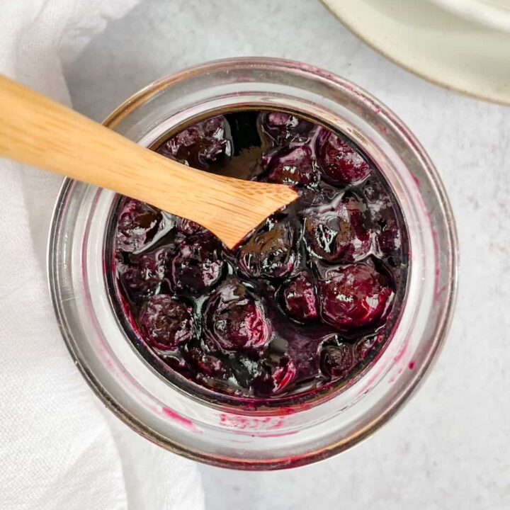 Jar of homemade blueberry compote.