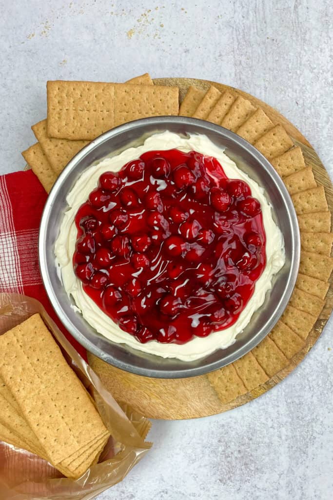 Cherry cheesecake dip served with graham crackers.