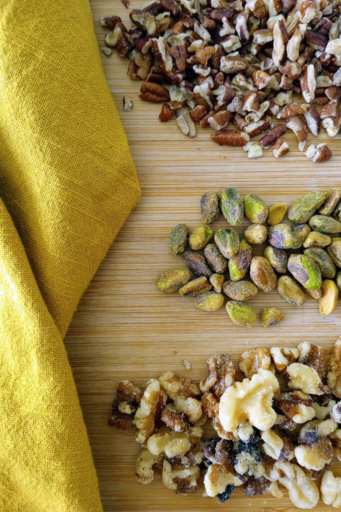 Pine nuts, Pistachios, and chopped walnuts are crunchy salad toppers.