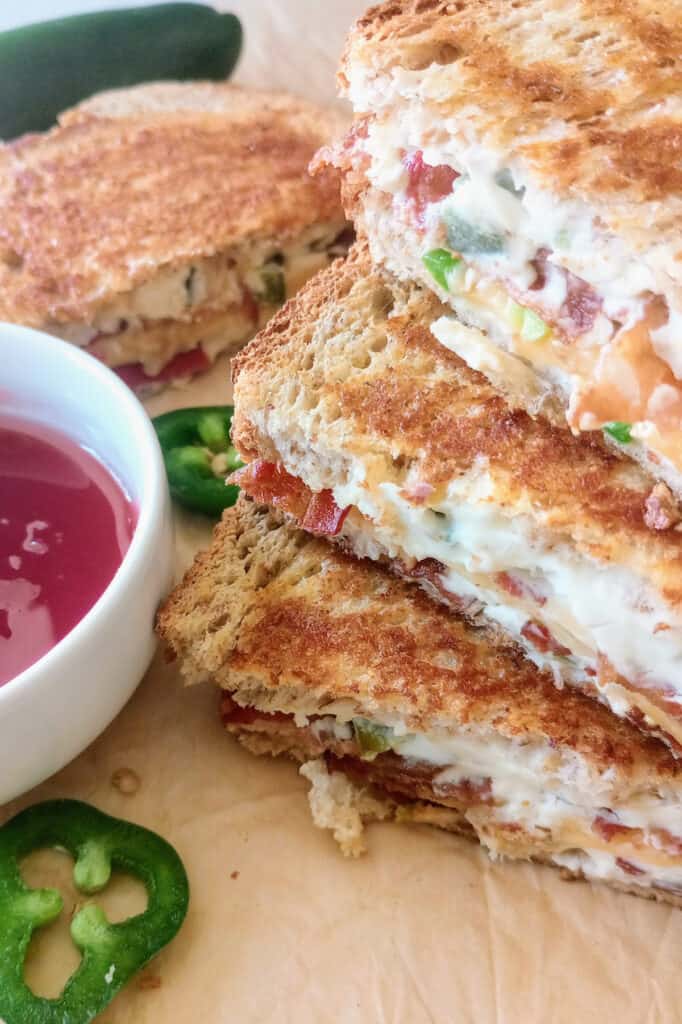 Jalapeno popper grilled cheese with light raspberry dipping sauce.