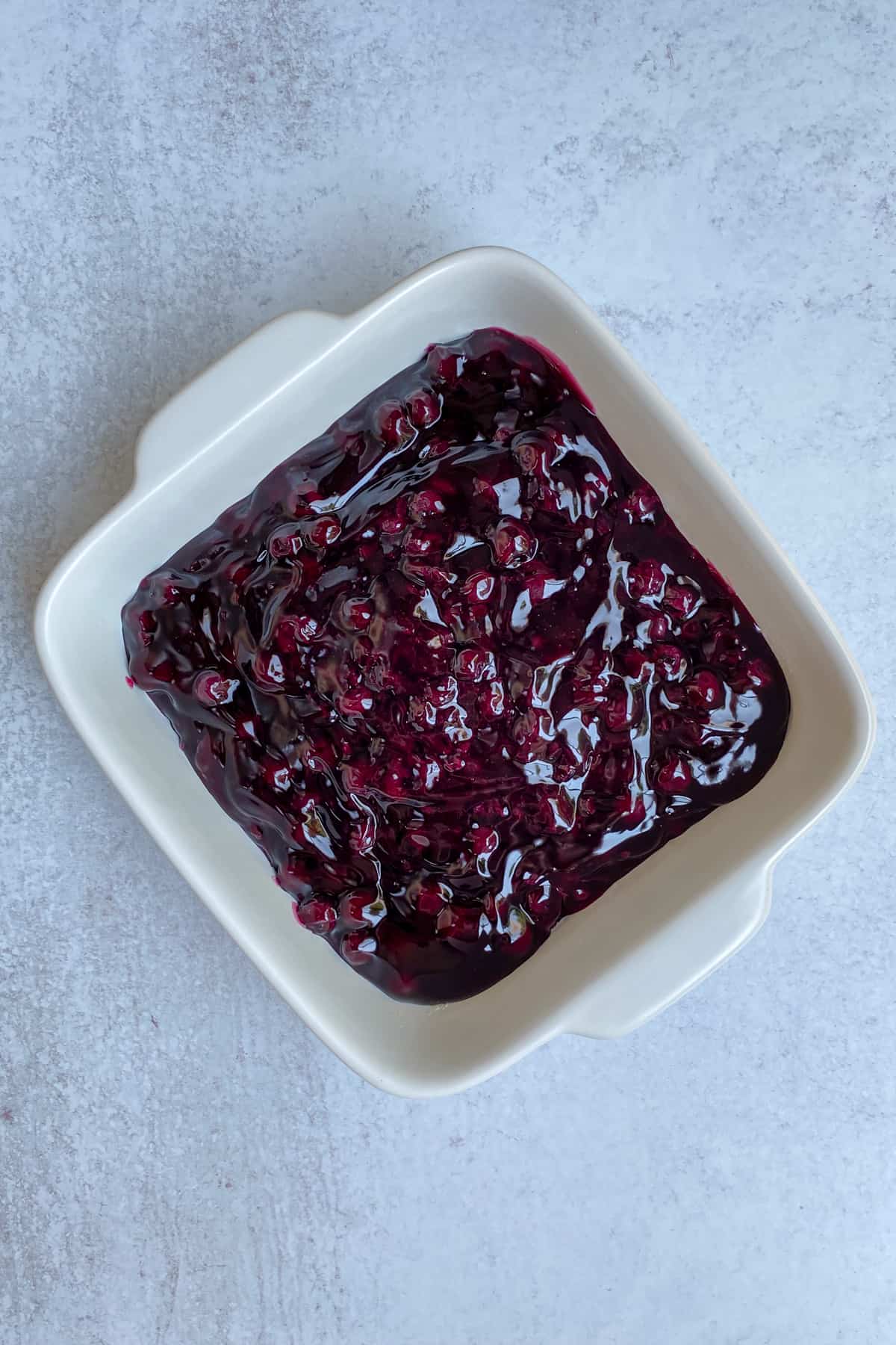 How to Make Blueberry Cobbler with Cake Mix Flavored Apron