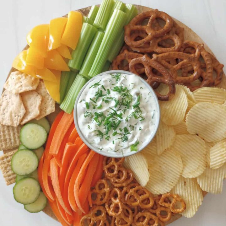 Dill pickle dip with a variety of crunchy, salted, healthy, dipping options.