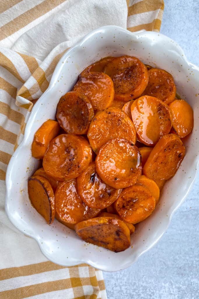 Baked orange candied sweet potatoes out of the oven and ready to be served.