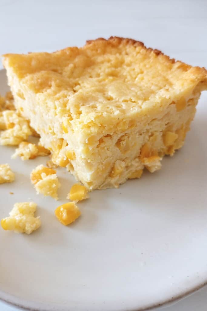 Classic corn casserole on a grey plate.