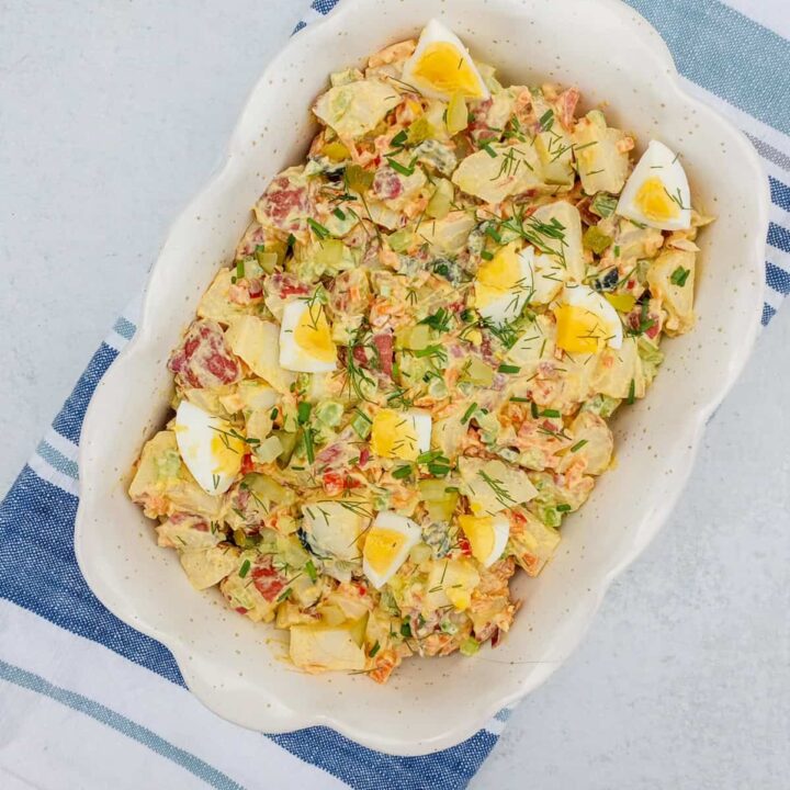 Red potato salad without mayonnaise in a serving dish.