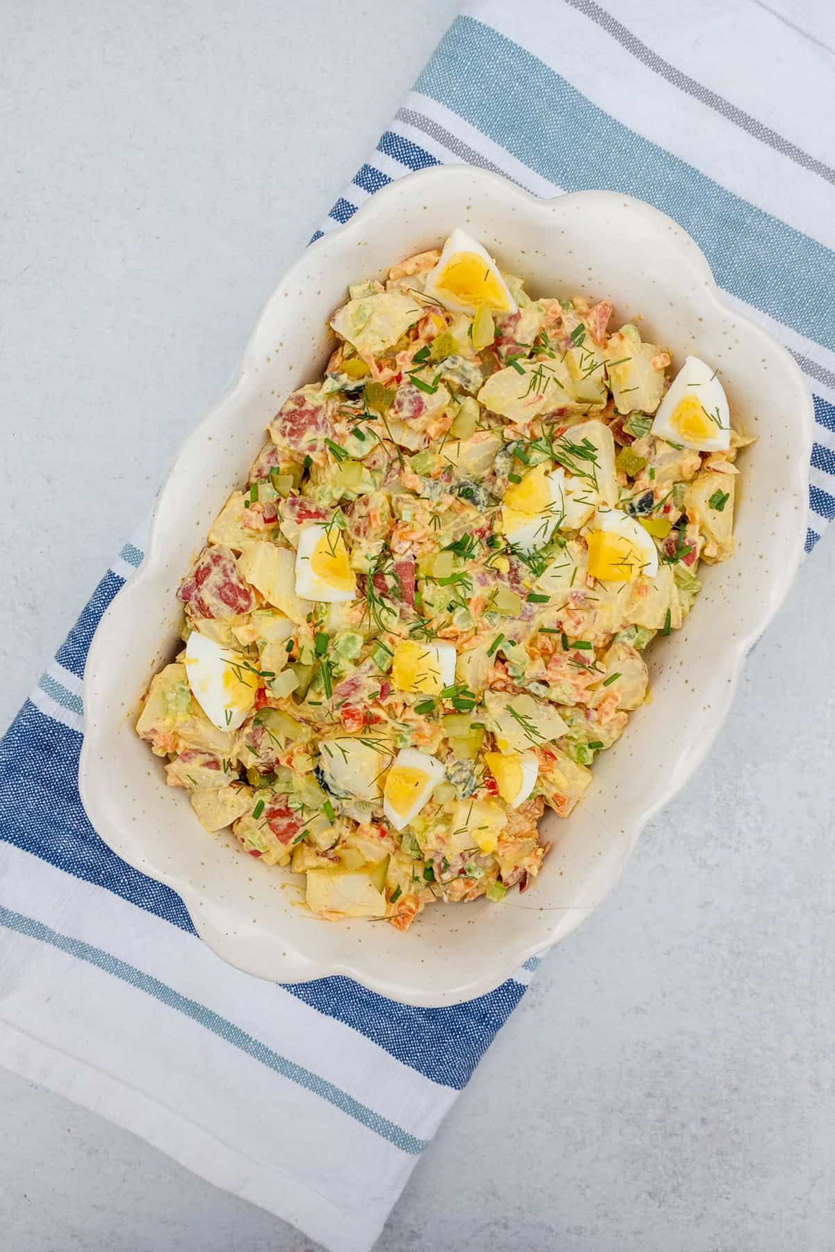 Red potato salad without mayonnaise in a serving dish.
