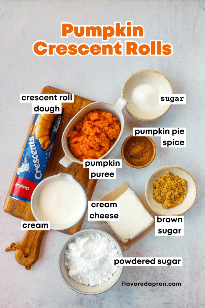 Overhead picture showing a tube of Pillsbury crescents and all the ingredients to make pumpkin cream cheese crescent rolls in small bowls.