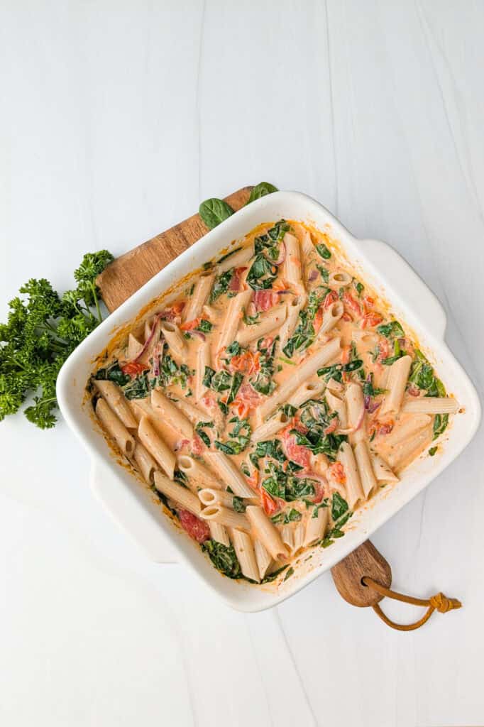 Overhead picture of baked Boursin cheese pasta in a baking dish. 