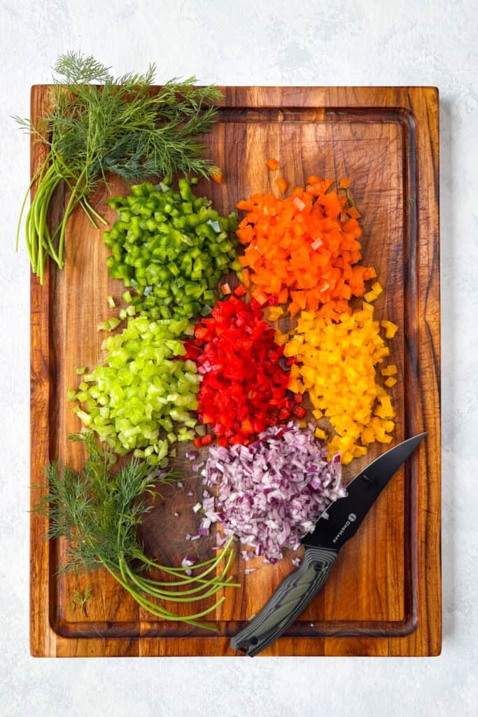 Overhead picture of finely diced veggies for pasta salad.