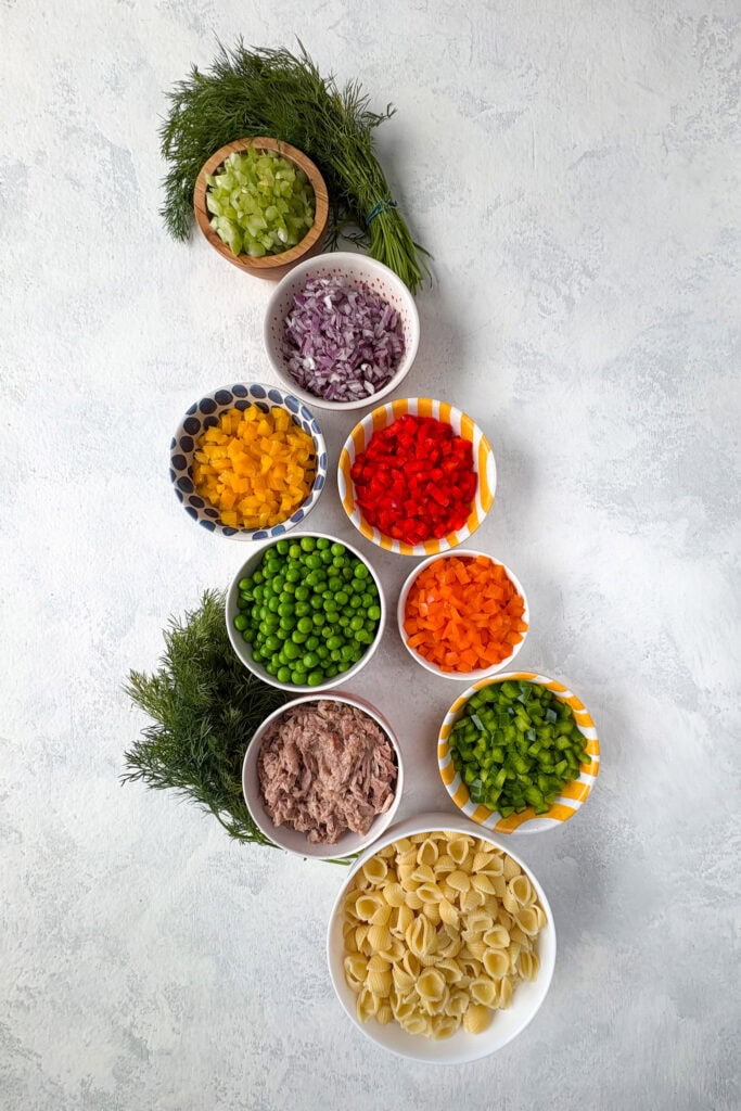 Overhead picture of all the ingredients needed to make the best tuna pasta salad.